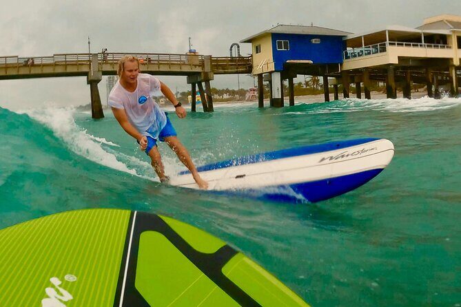 Epic Surf Lessons Dania Beach - Shallow water practice: catching waves with your instructor next to you