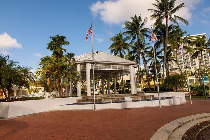Fort Lauderdale Riverwalk Self-guided Audio Walking Tour - New River Yacht Club apartments, Go Riverwalk bricks, and Rio Vista